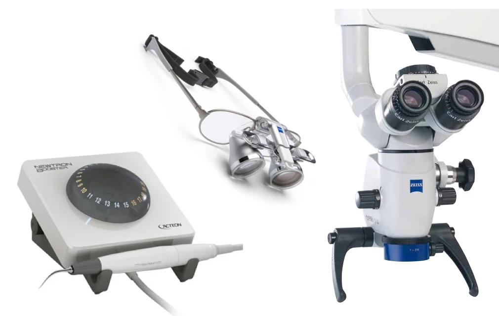 Imagem de equipamentos odontológicos, incluindo um microscópio Zeiss, um controlador eletrônico e lupas de aumento. Ideal para odontologia de precisão.