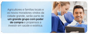 Na imagem tem um homem e uma mulher sorrindo, representando paciente e dentista, representando um contexto em que as pessoas das cidades grandes que se mudam para o interior possuem um grande potência em investir em saúde e estética.