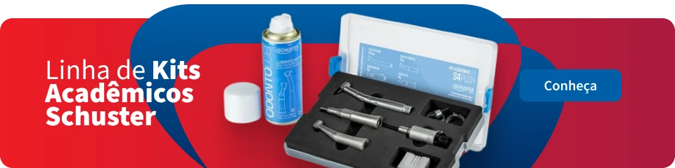 Imagem de um kit acadêmico Schuster para estudos dentários, contendo brocas, cartucho com spray de limpeza e manual, ideal para estudantes e profissionais da área odontológica.